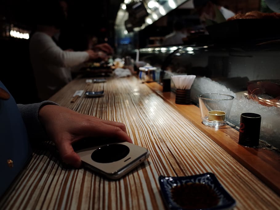 human, person, restaurant, pub, bar counter, phone, cell phone HD wallpaper
