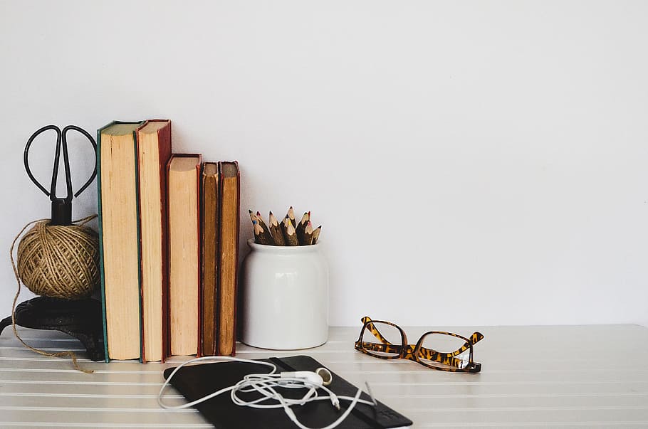 assorted-color pencil lot in white ceramic jar, book, desk, glasses HD wallpaper