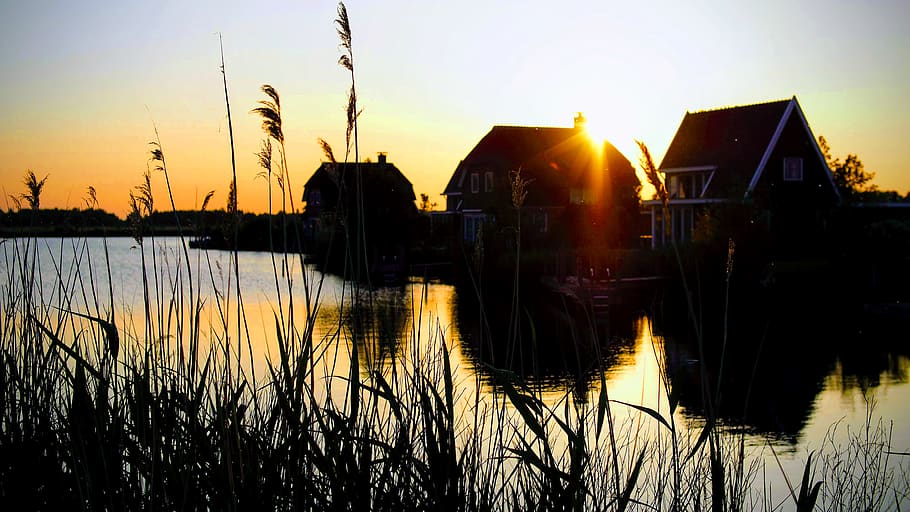 Silhouette Photograph of Houses Beside River, dawn, evening, grass HD wallpaper
