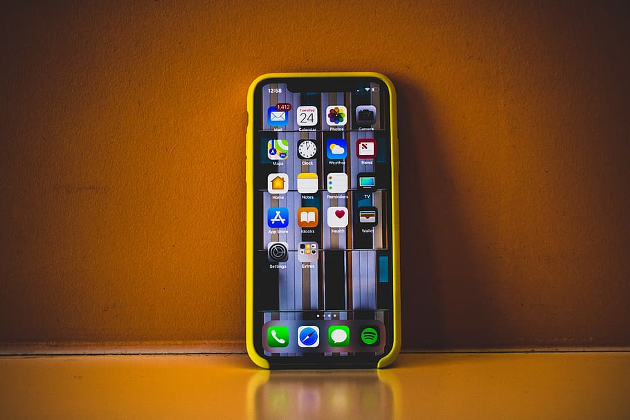 Turned on Iphone X With Yellow Case, cell phone, cellphone, cellular telephone, HD wallpaper