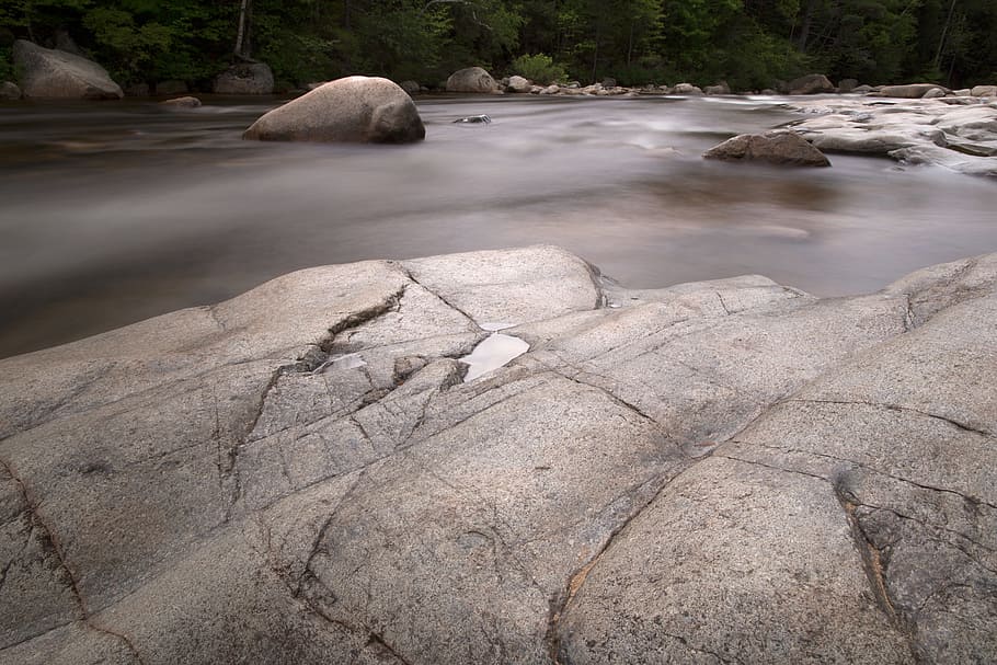 Photography of Rock Formation on Body of Water, boulders, daylight HD wallpaper
