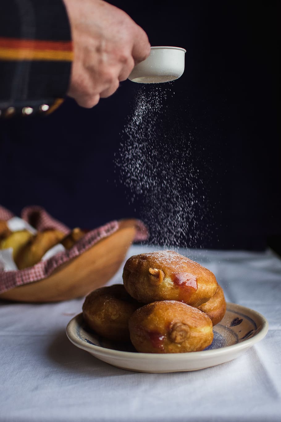 pastry sprinkled with sugar, food and drink, one person, indoors HD wallpaper