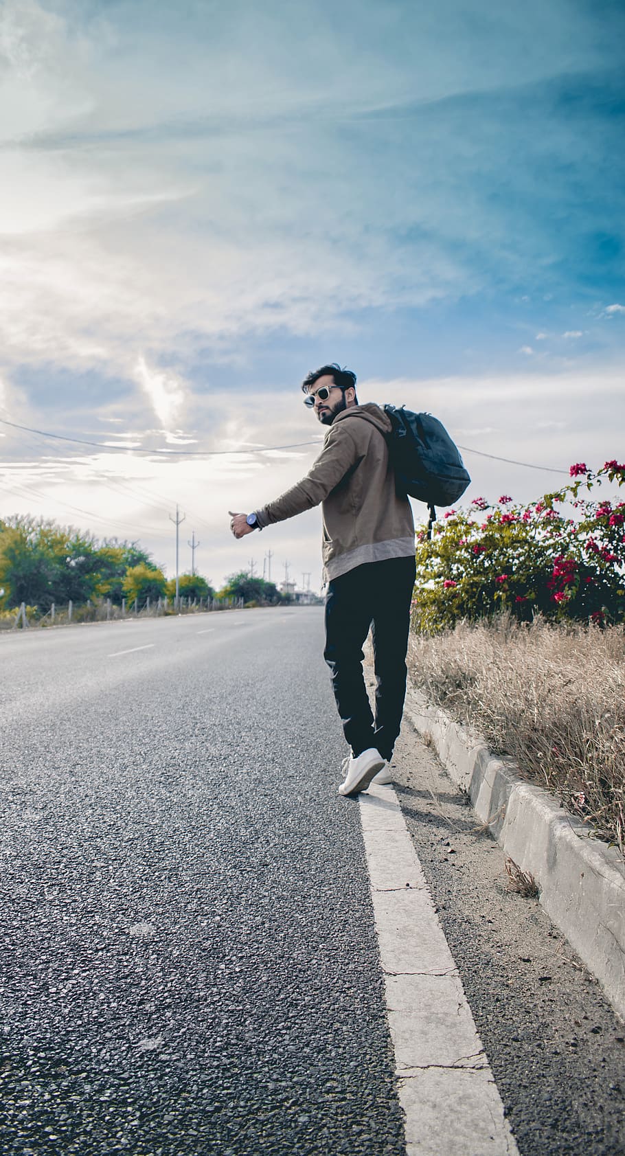man walking at road while holding backpack, shoe, apparel, footwear, HD wallpaper