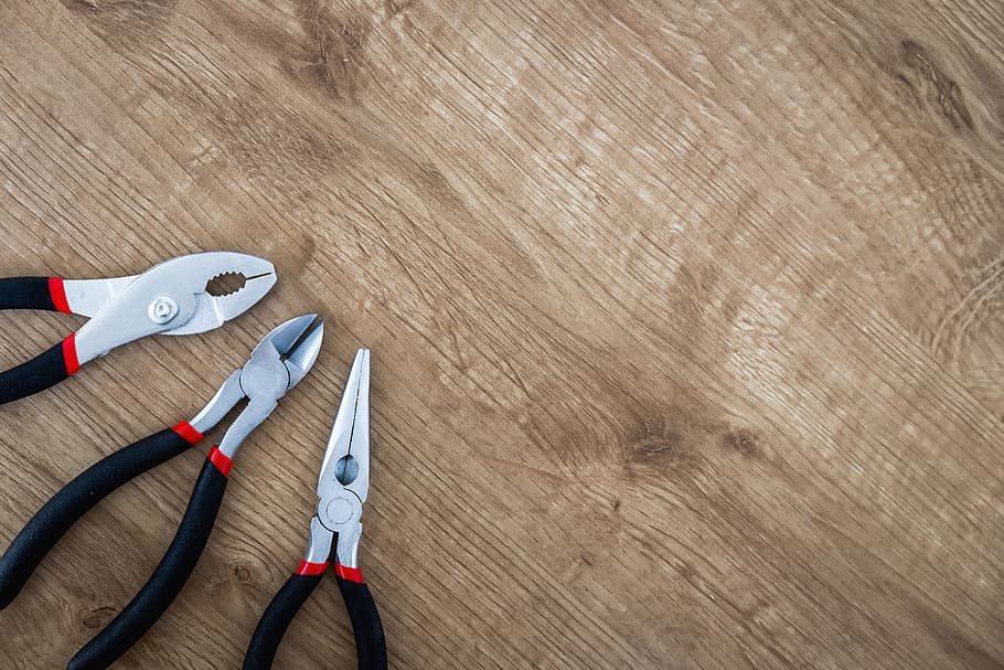 Set of pliers tools on wooden board, wood - material, equipment HD wallpaper