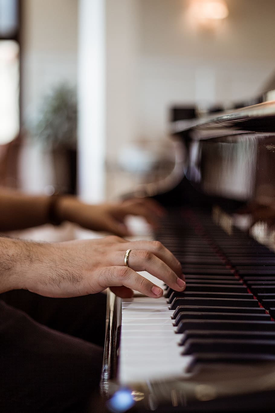 Person Wearing Ring Playing Piano, depth of field, ebony, ivory