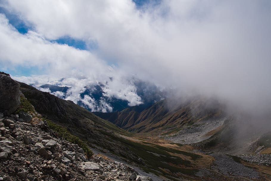 clouds, mist, fog, rocks, sky, mountain range, mountains, beauty in nature HD wallpaper