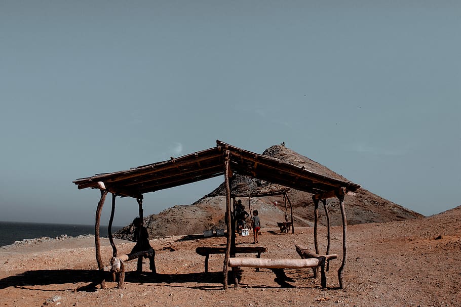 Person Standing Under Hut, benches, boy, daylight, daytime, fashion HD wallpaper