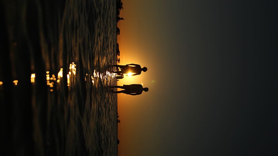 two people standing in ocean, human, person, nature, outdoors HD wallpaper
