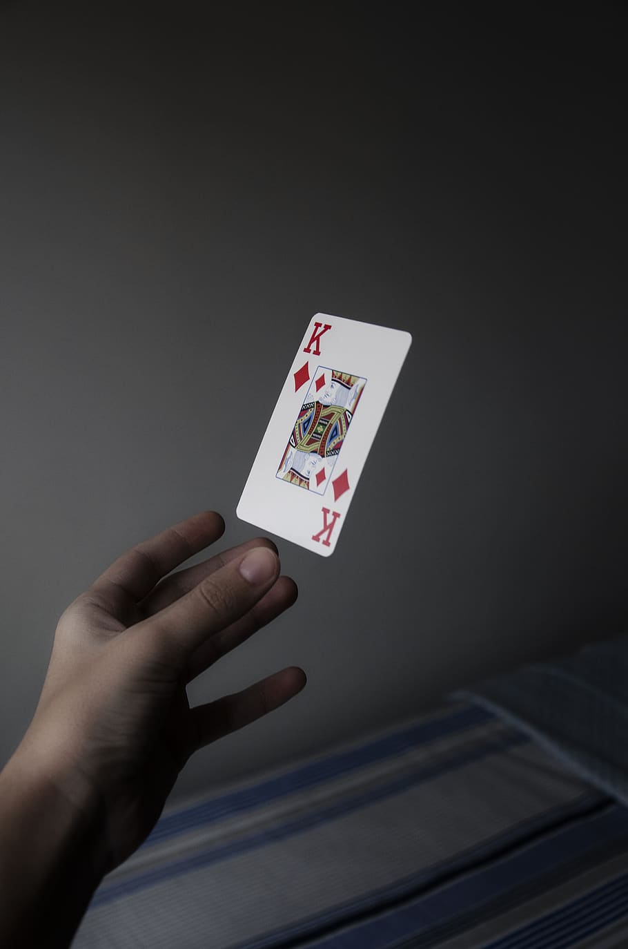 Person Holding King of Diamonds Playing Card, casino, floating