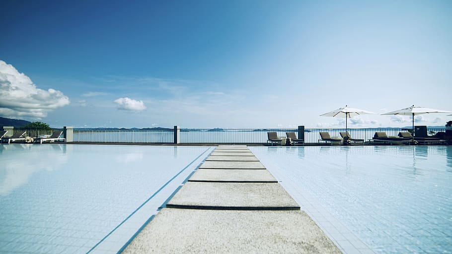 concrete pathway in between pool during daytime, water, swimming pool HD wallpaper