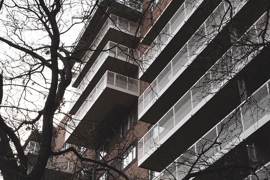 brown concrete building, town, city, urban, high rise, apartment building HD wallpaper