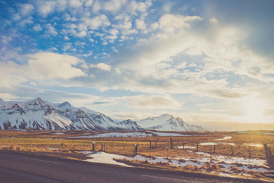 Snow Mountain Near Brown Field Under Cloudy Sky, adventure, blue sky HD wallpaper