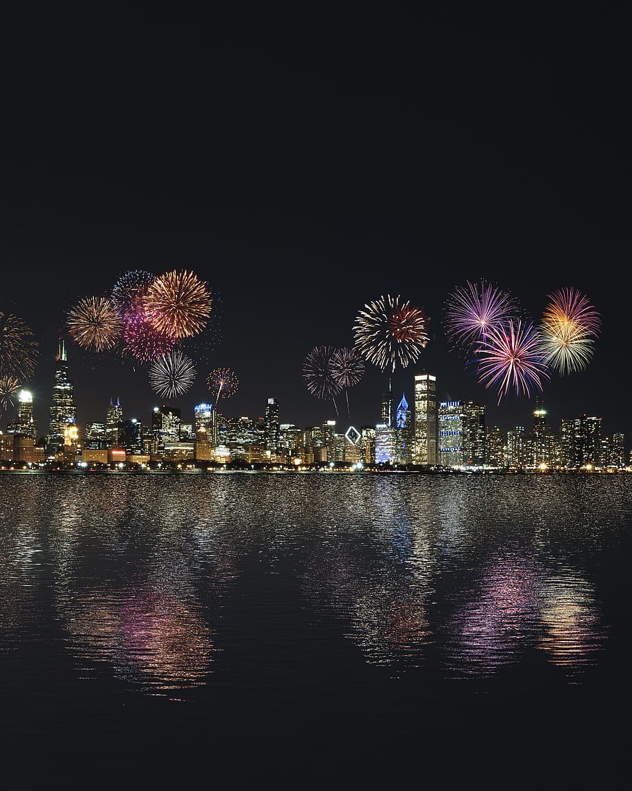 skyline buildings under fireworks display, nature, outdoors, night HD wallpaper