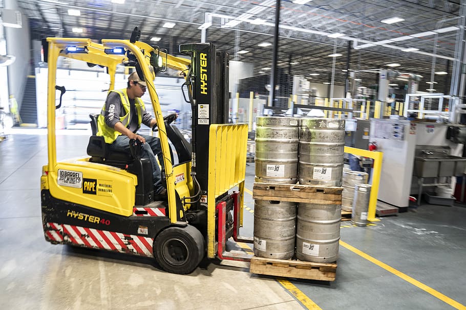 Person Driving Yellow Forklift, container, crate, factory, heavy equipment