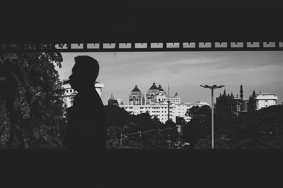 man standing near building, silhouette, human, person, architecture HD wallpaper