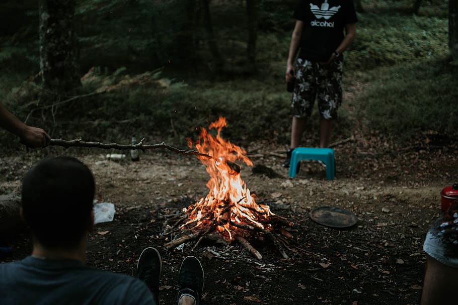 Man Sitting Near Bonfire, barbecue, bbq, environment, firewoods HD wallpaper