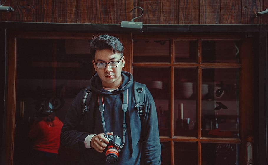 Man Wearing Jacket Holding Dslr Camera, CCTV, eyewear, facial expression HD wallpaper