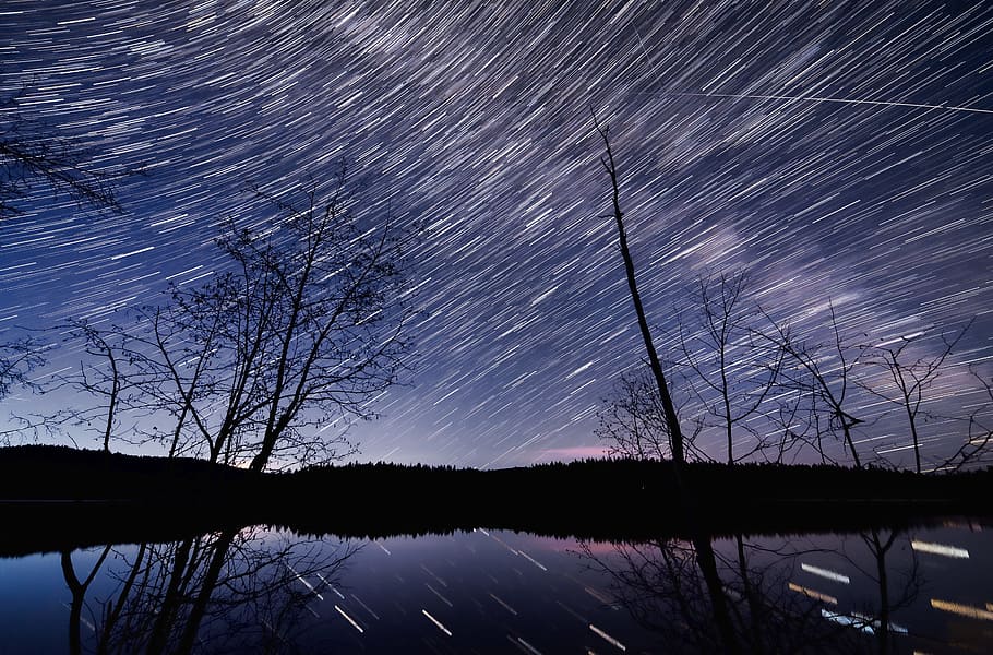 silhouette of trees and mountain during night time, star, star trail HD wallpaper