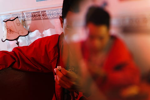 man in red jacket sitting, human, person, finger, clothing, apparel HD wallpaper