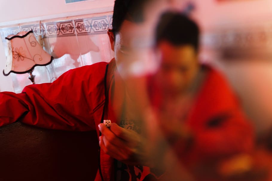 man in red jacket sitting, human, person, finger, clothing, apparel HD wallpaper