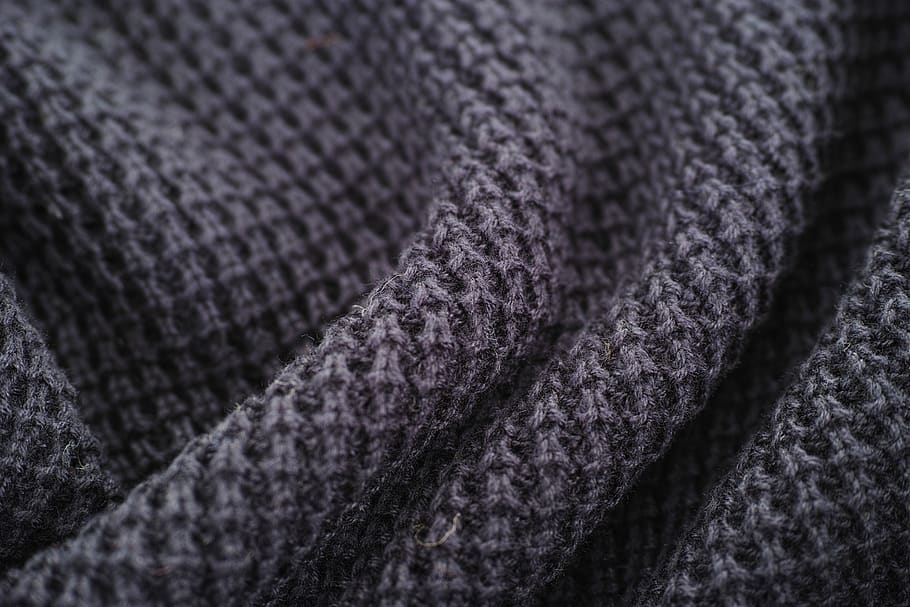 A close up of a gray fabric with a blurry background photo – Free Gray  Image on Unsplash