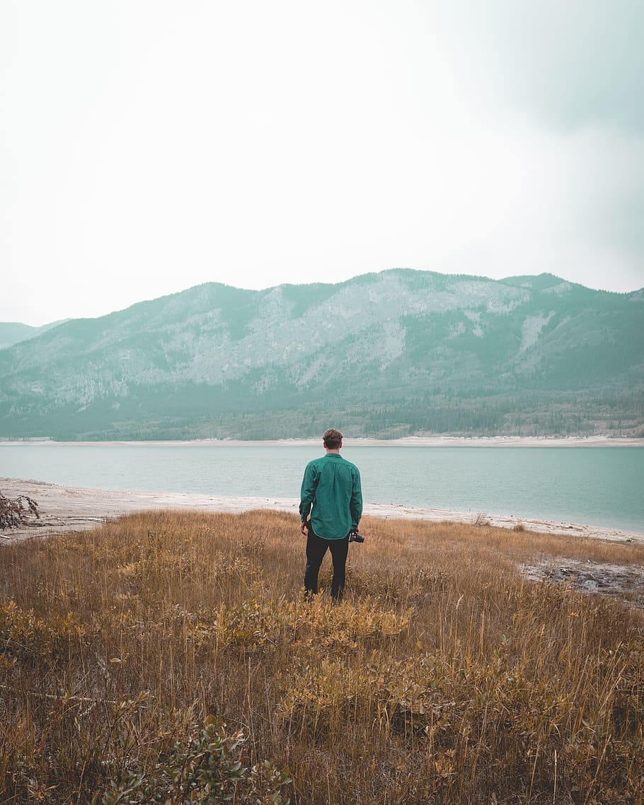 banff, canada, mountains, exploring, photography, man standing by lake HD wallpaper