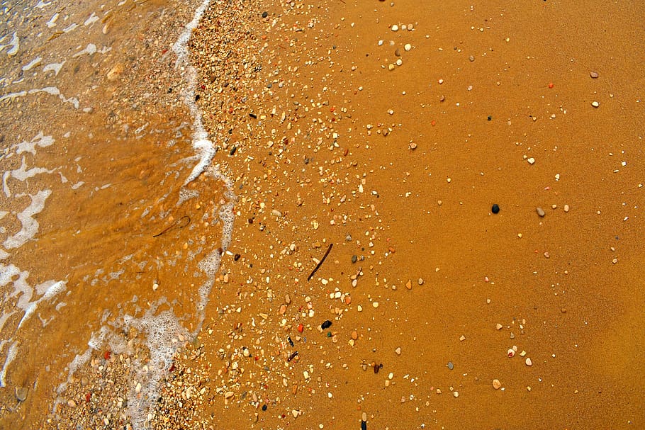 sand, red sand, beach, pebbles, colorful pebbles, sea, sea foam