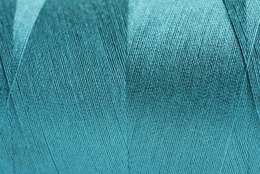 Close-up of blue color thread texture in a spool, Clothing, Material
