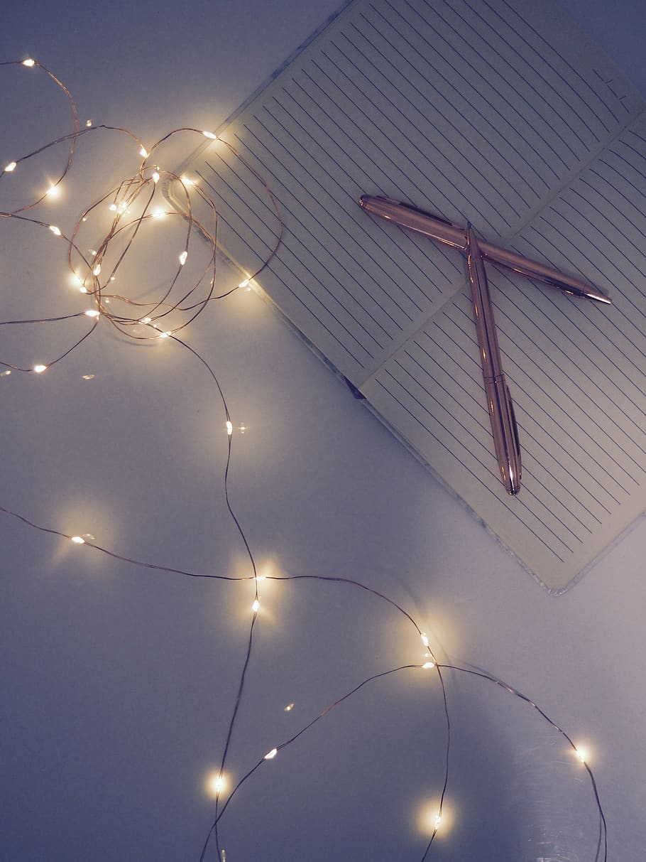 Two Pens on Notebook, illuminated, lights, page, string lights HD wallpaper