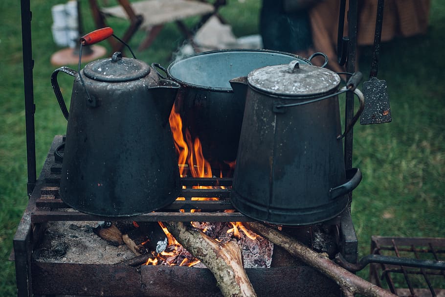 Three Black and Gray Pots on Top of Grill With Fire on Focus Photo HD wallpaper