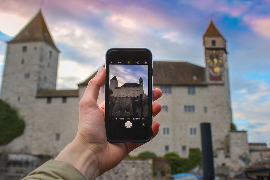 Person Holding Space Gray Iphone, architecture, blur, building HD wallpaper