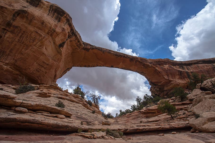 Brown Rock Formations, arch, arid, barren, blue, bridge, canyon HD wallpaper
