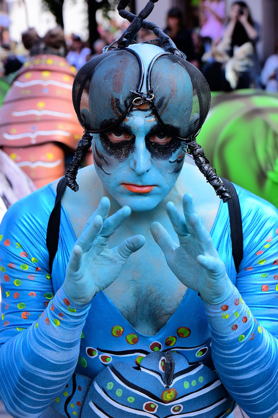 fly, blue, mask, insects, hands, festival, front view, focus on foreground HD wallpaper