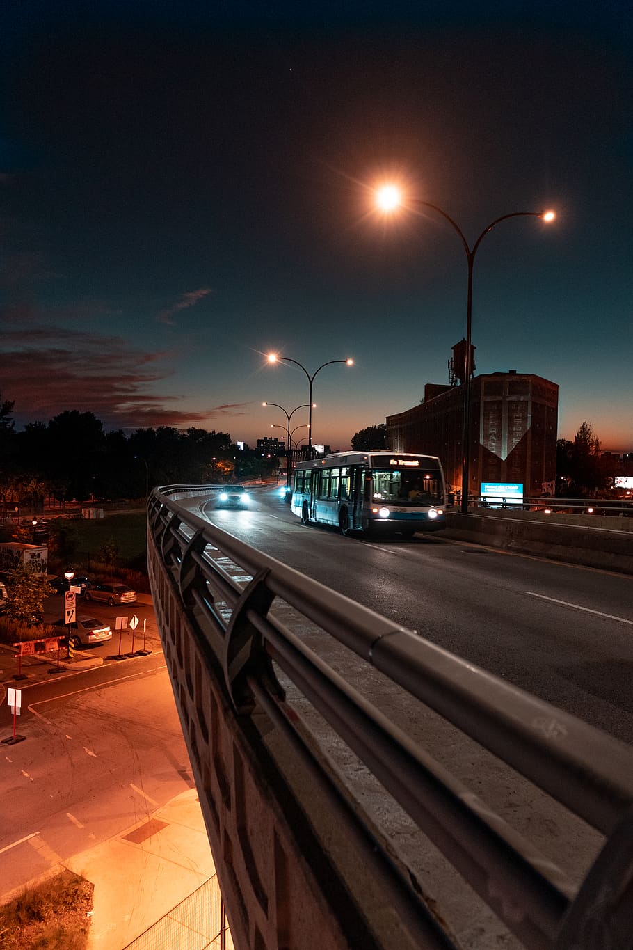 bus on road during nighttime, banister, handrail, way, tarmac HD wallpaper