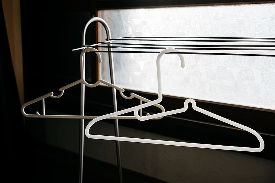 two white clothes hangers, hanged, furniture, fashion, white hanger