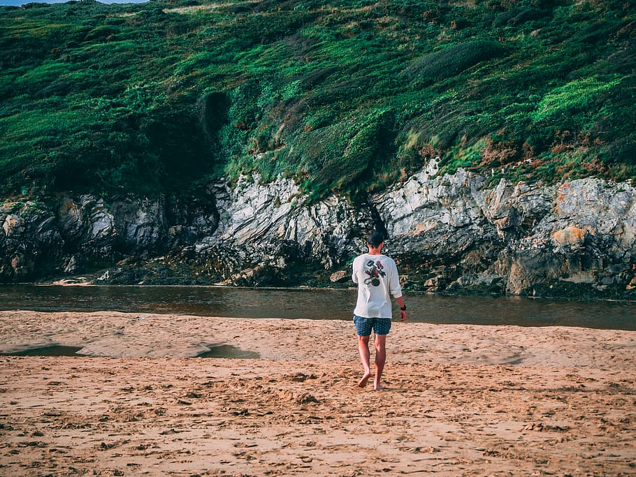 man standing near river, clothing, shorts, apparel, human, person HD wallpaper