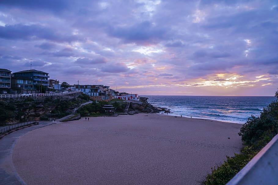 White Sandy Beach Under Cloudy Sky, buildings, clouds, evening HD wallpaper