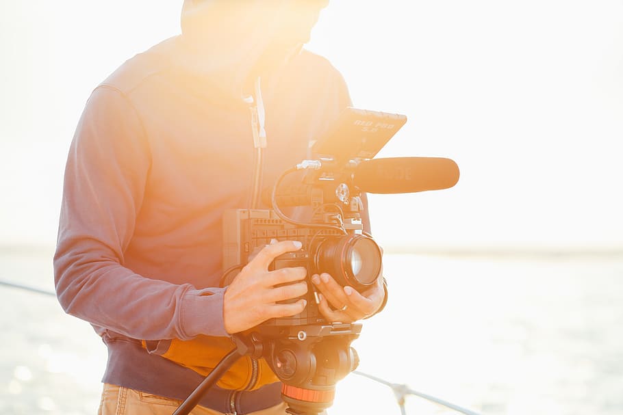 man in jacket holds camera, human, person, photography, photographer HD wallpaper