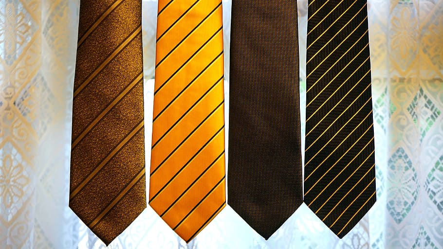 Four Assorted-color Neckties on Gray Textile, accessories, accessory