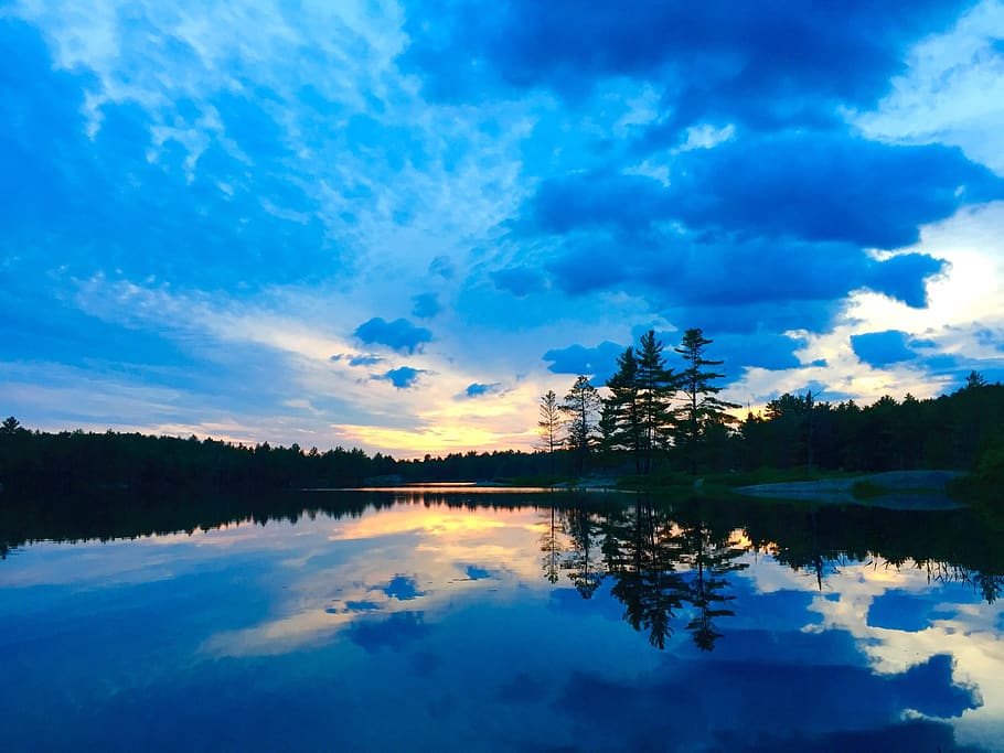 lake, sunset, reflection, glassy, water, trees, sky, nature HD wallpaper
