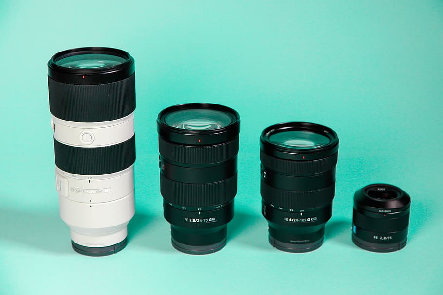 four camera lenses, still life, group of objects, indoors, no people HD wallpaper