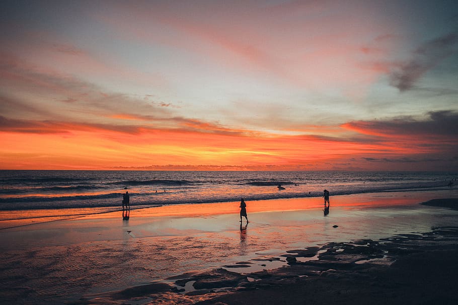 People on Beach during Golden Hour, calm, coast, dawn, dramatic sky HD wallpaper