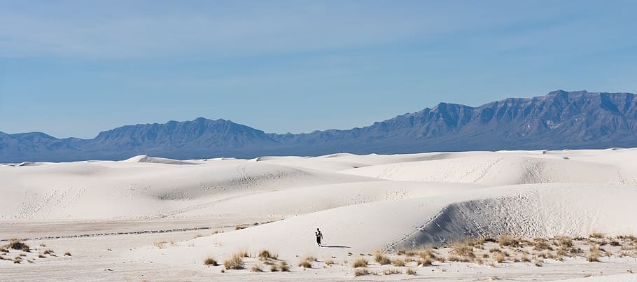 person standing on snow-covered mountain during daytime, soil, HD wallpaper