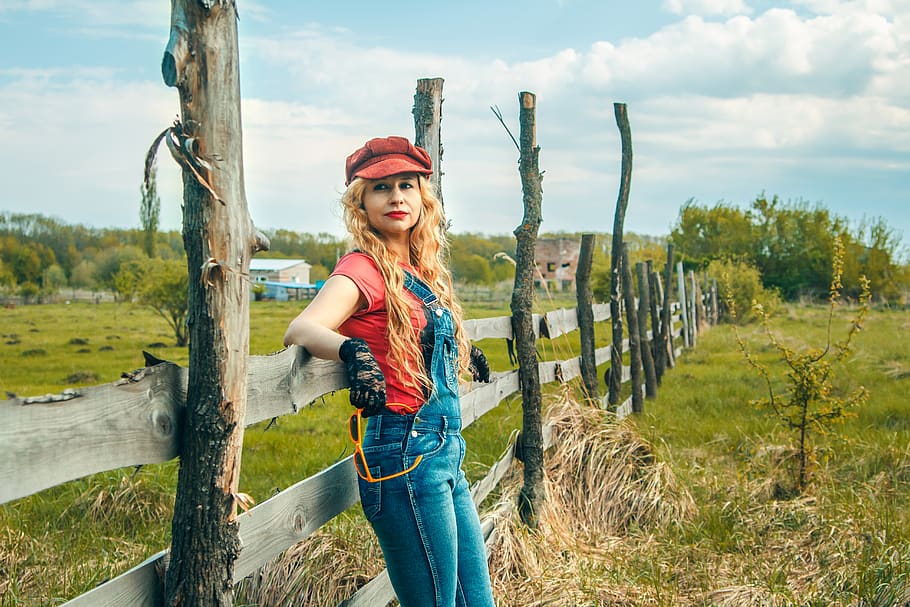 Photo of a Woman Resting Her Both Elbow on Wooden Fence, blonde, HD wallpaper