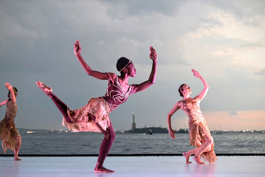 Three Women Dancing Near Body of Water, active, beach, blurred background HD wallpaper