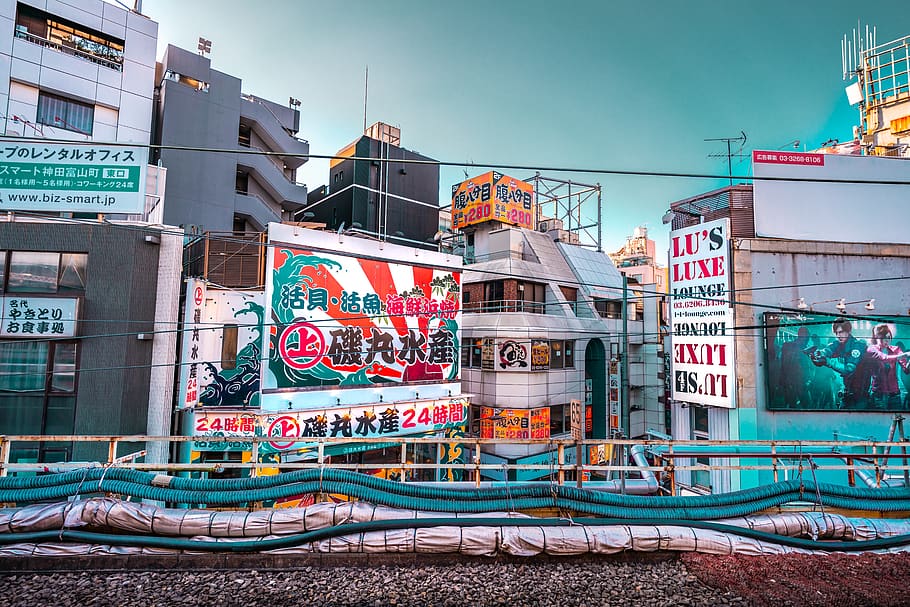 multicolored building under clear blue sky, japan, tokyo, person HD wallpaper