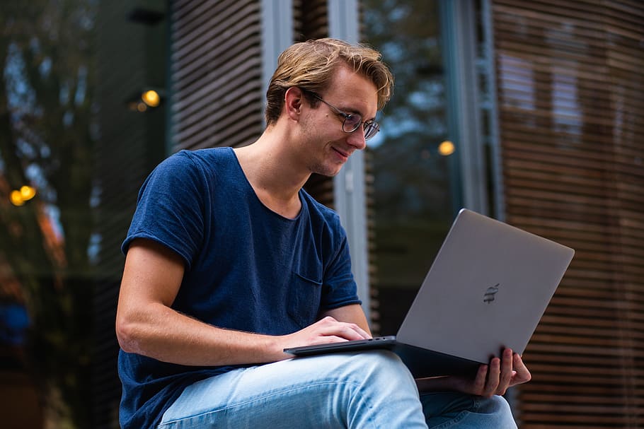 Selective Focus Photo of Man Using Laptop, casual, college, computer HD wallpaper