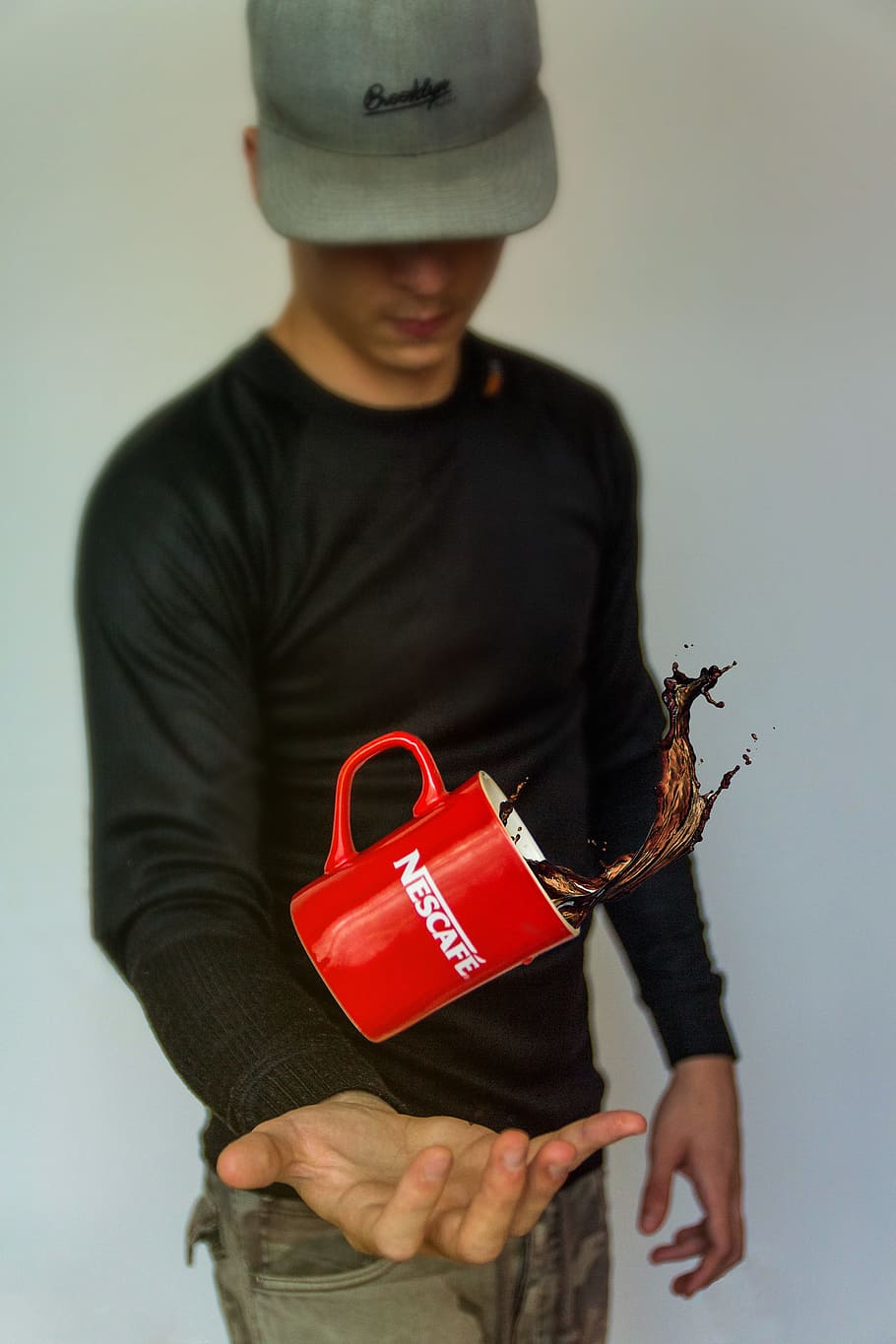 Photo Of Man Tossing Nescafe Mug, coffee, cup, drink, long-exposure HD wallpaper