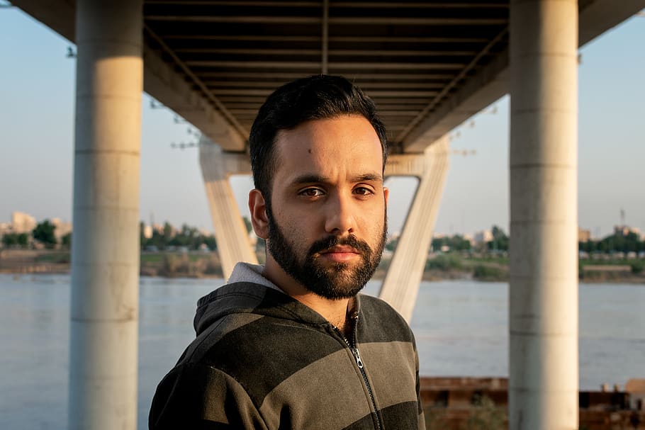 man standing under bridge, portrait, beard, architecture, one person HD wallpaper