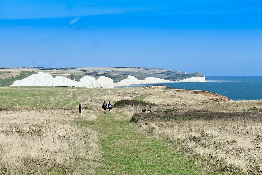cliffs, walking, sky, coast, landscape, hiker, summer, grass HD wallpaper